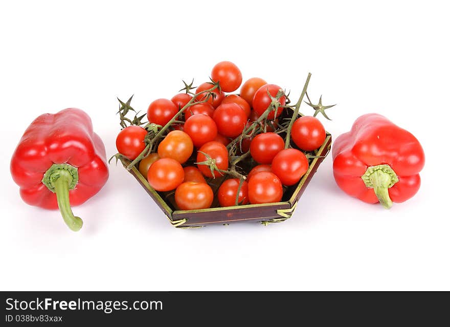 Cherry tomato and red pepper, on a white background