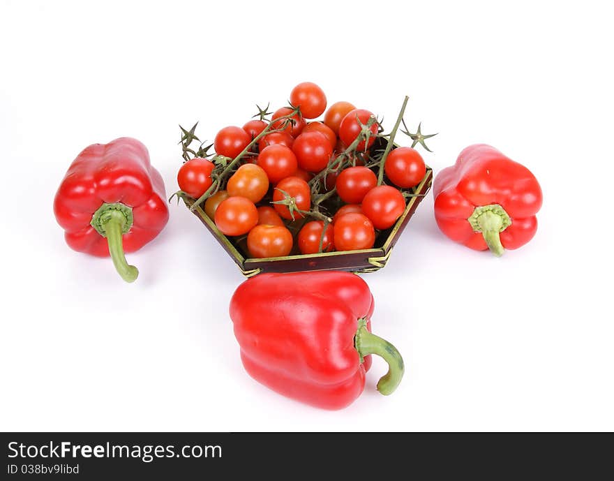 Cherry tomato and red pepper, on a white background