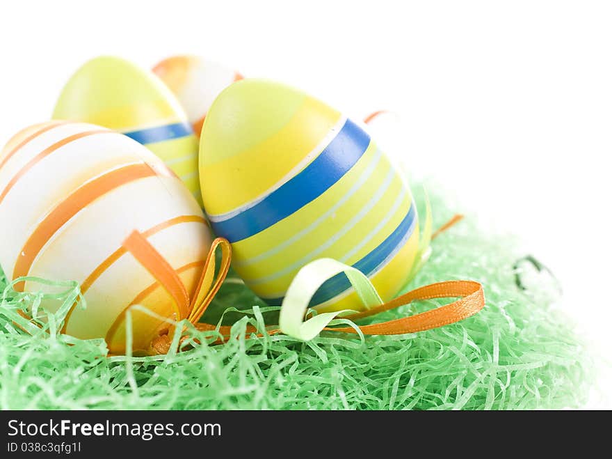 Colorful Easter Eggs on green Grass