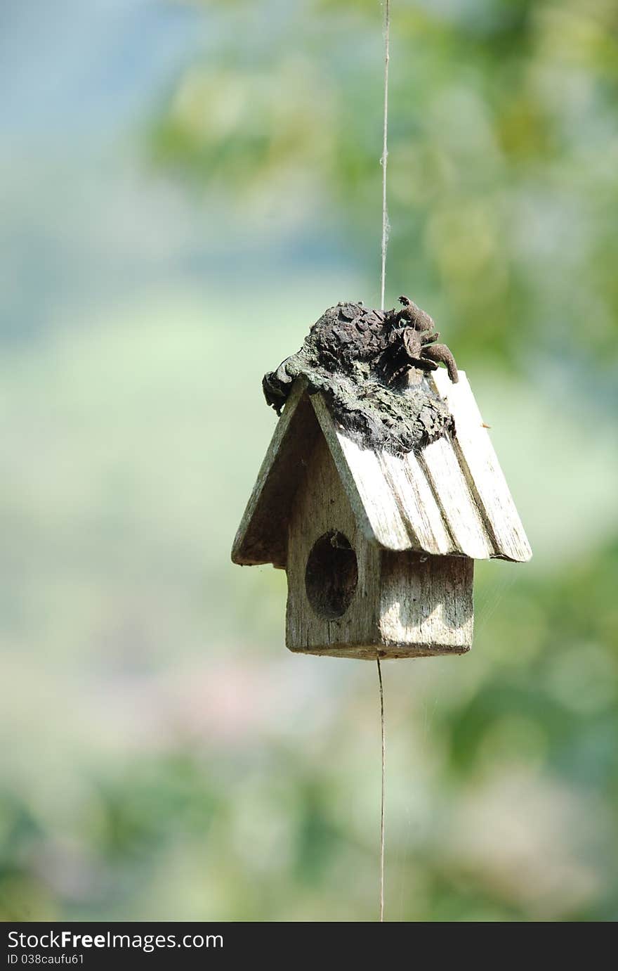 Small wood house mobile made in northern part of Thailand in simple design. Small wood house mobile made in northern part of Thailand in simple design.