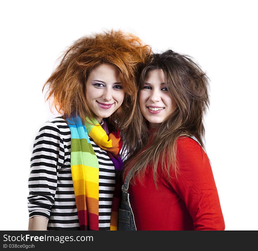 Two funny girls. Studio shot.