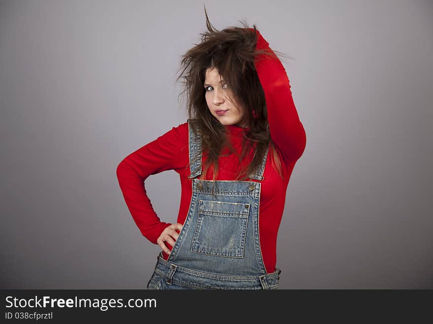 Fashon girl in red. Studio shot.