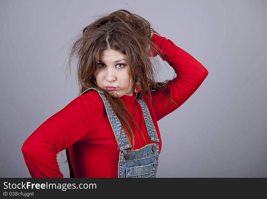 Fashon girl in red. Studio shot.