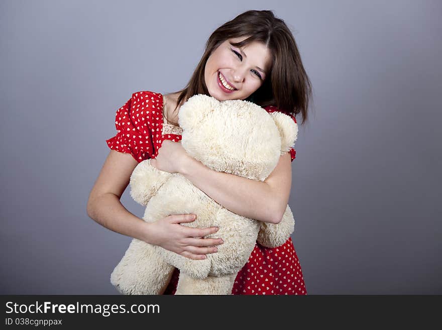 Funny girl with teddy bear