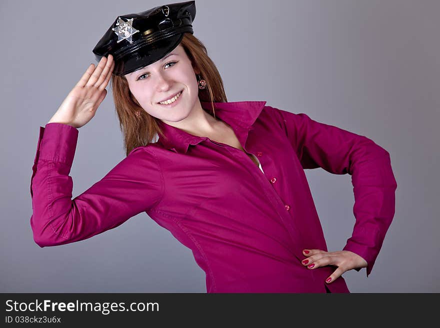 Girl in cap. Studio shot.