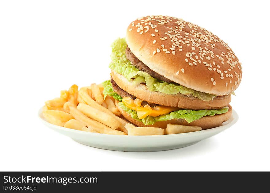 Cheeseburger with fries on a white background