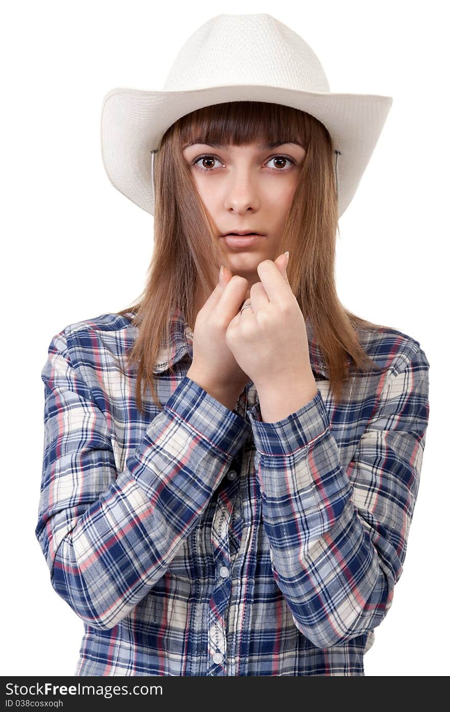 Portrait of a girl in a hat covering the face hair