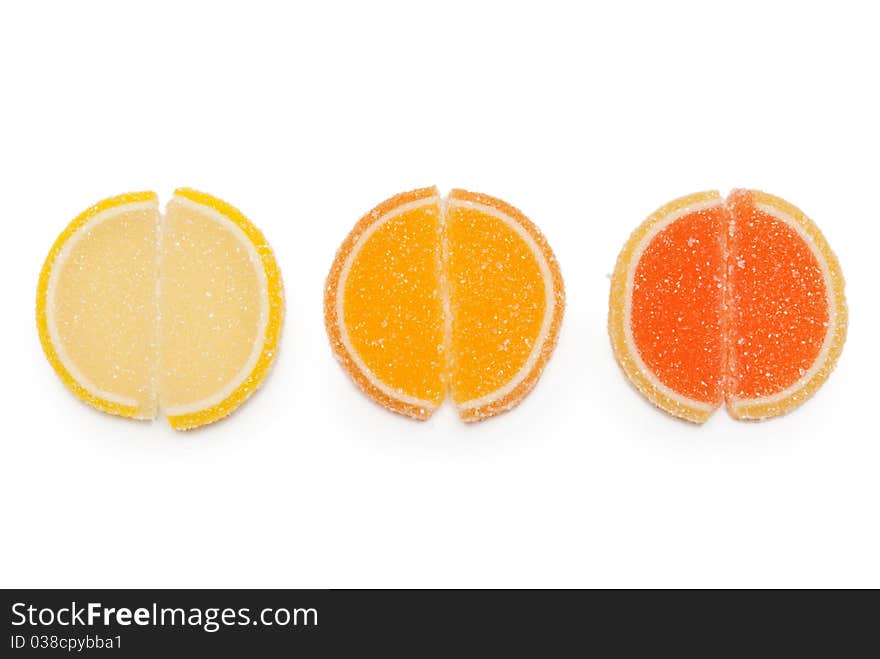 Three round jelly candy on a white background