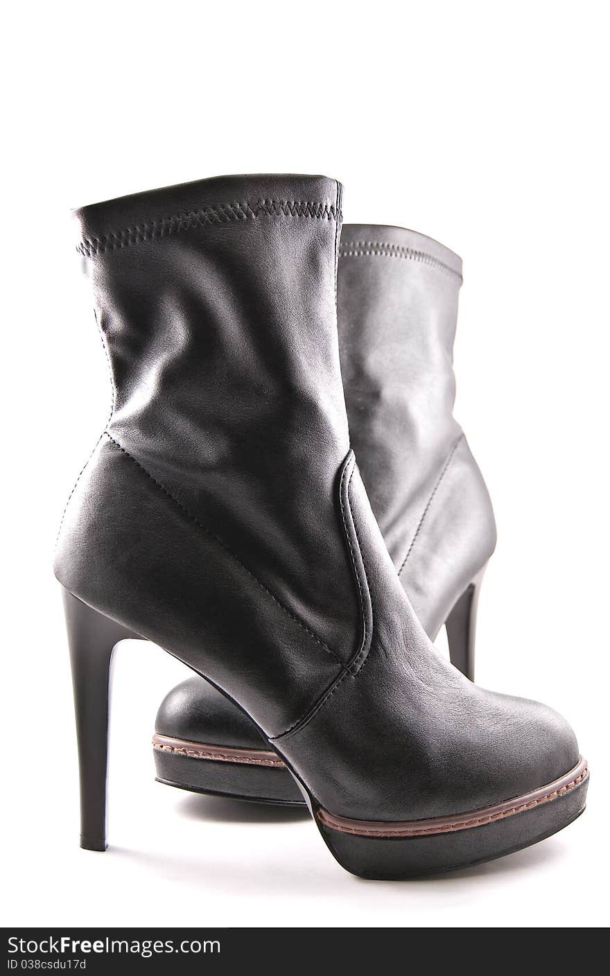 The Feminine leather boots on high heel.