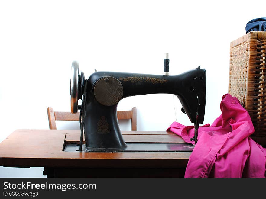 Vintage Sewing machine isolated over a white background