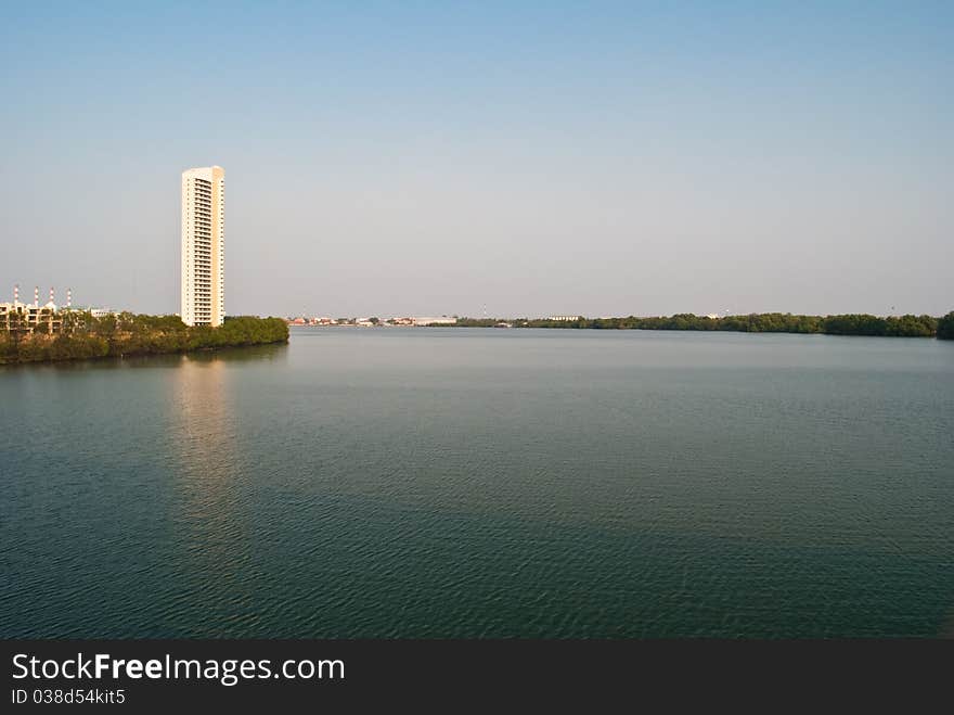 Thai River With Building.