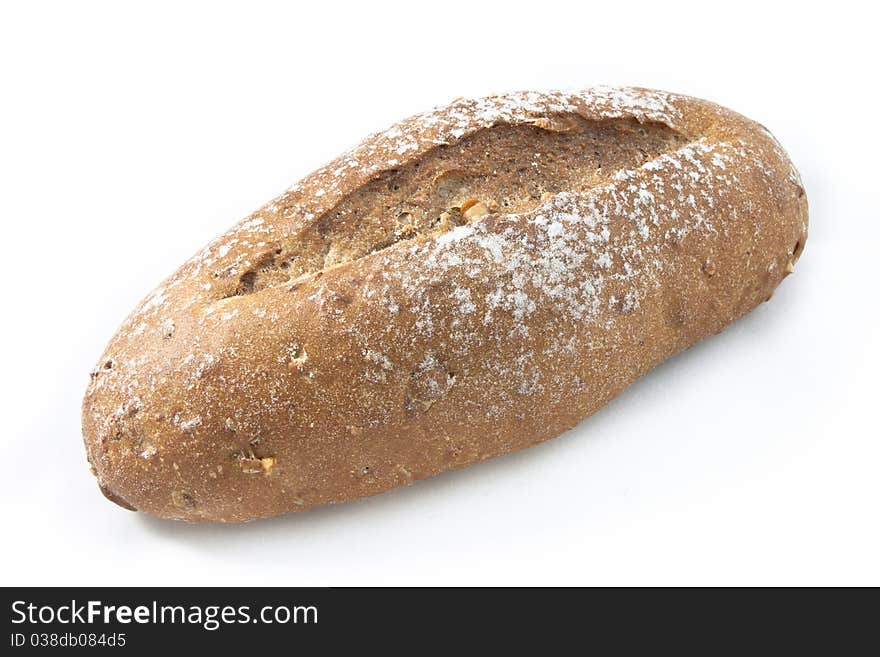 Baked multigrain bread on white background