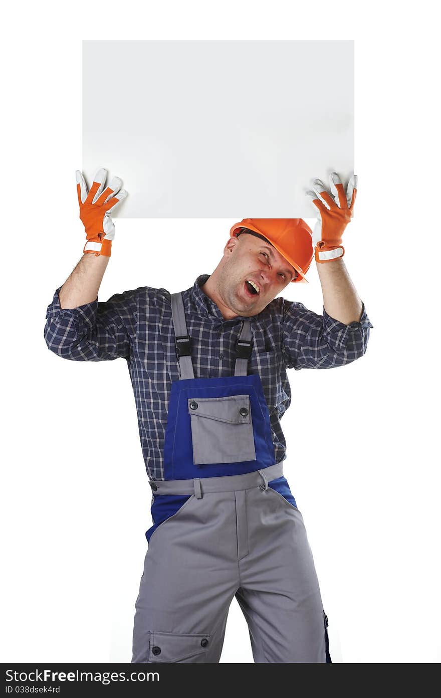 The man in the workers' clothes in a helmet on a white background. The man in the workers' clothes in a helmet on a white background