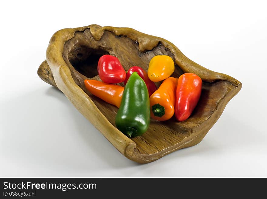 Colorful paprika on wooden tray