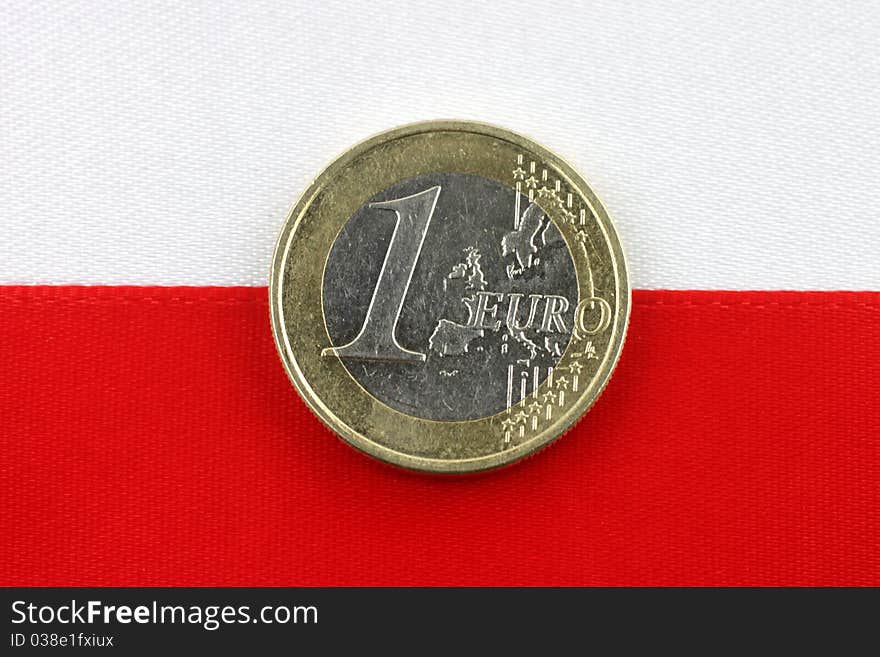 Polish Flag With One Euro Coin.