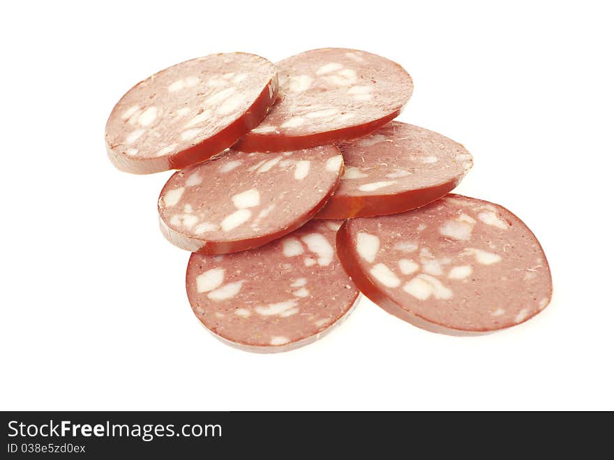 Sausage cut by slices on a white background