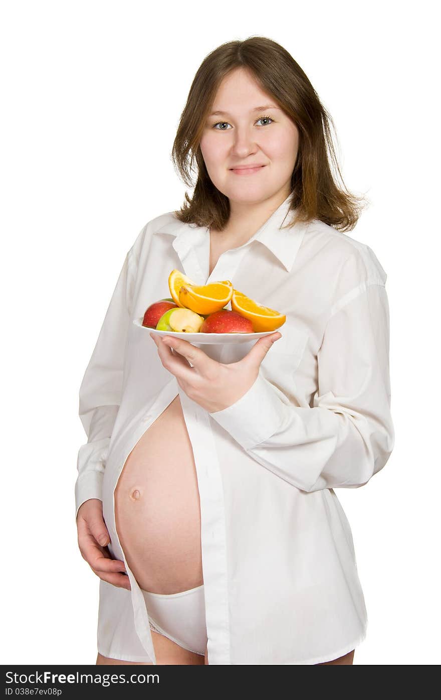 Adorable pregnant woman with healthy meal over white. Adorable pregnant woman with healthy meal over white