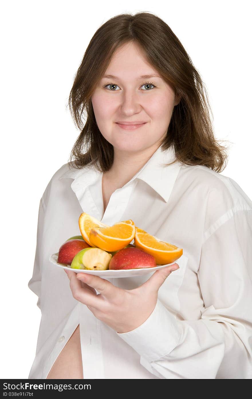 Portrait of attractive pregnant woman with fruits over white. Portrait of attractive pregnant woman with fruits over white