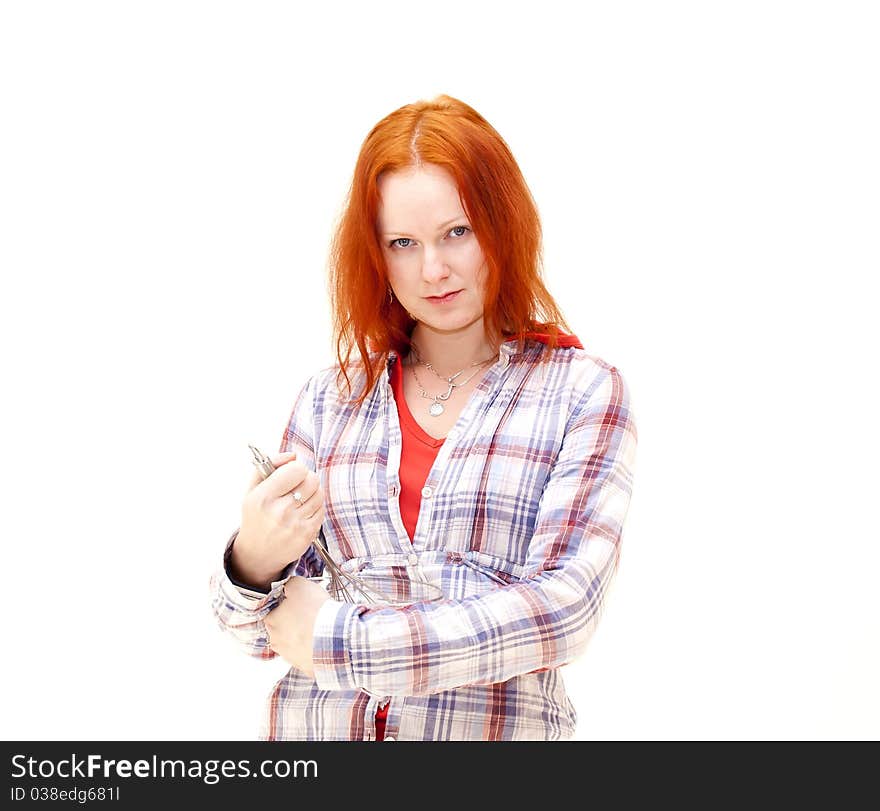 Redhead young woman cooks dinner isolated on white