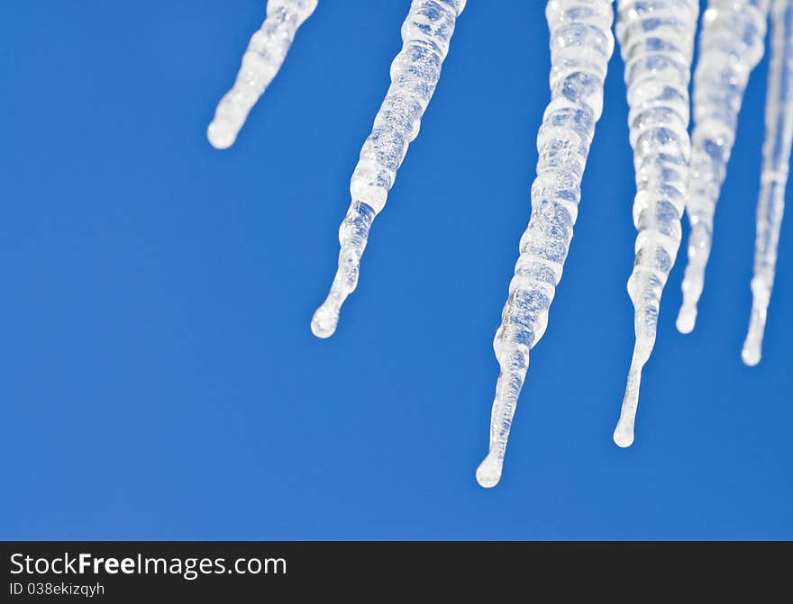 Icicles Against Deep Blue Sky