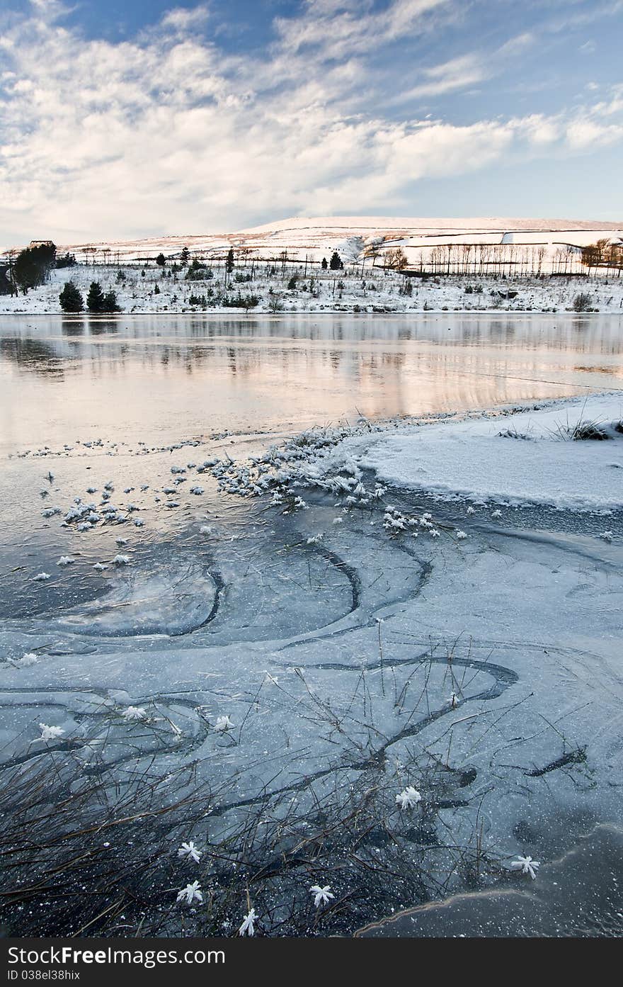 Icy Boulder Near Dam