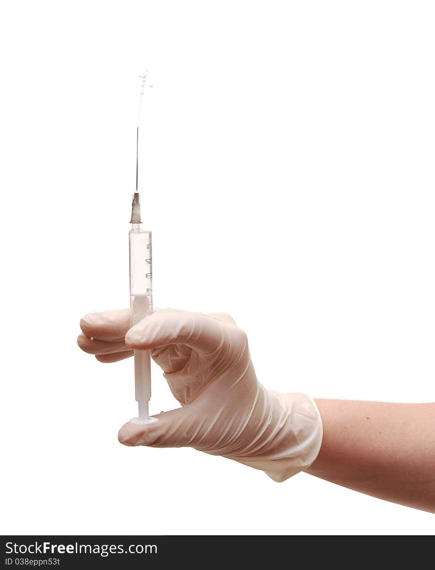 Hand holding syringe isolated on white background