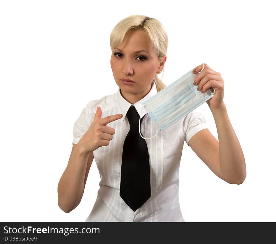 Girl demonstrates surgical mask isolated on a white background. Girl demonstrates surgical mask isolated on a white background.