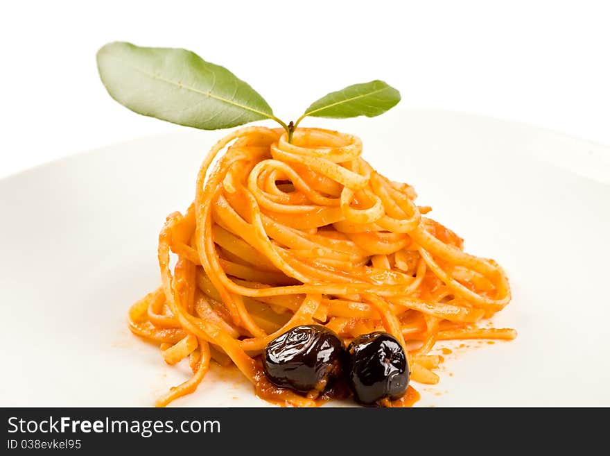 Spaghetti with olives and tomatoesauce. Spaghetti with olives and tomatoesauce