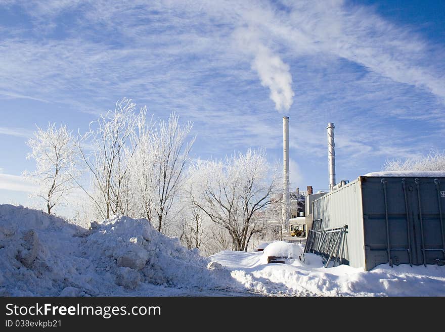 Industrial scene with snow and smokestacks. Industrial scene with snow and smokestacks