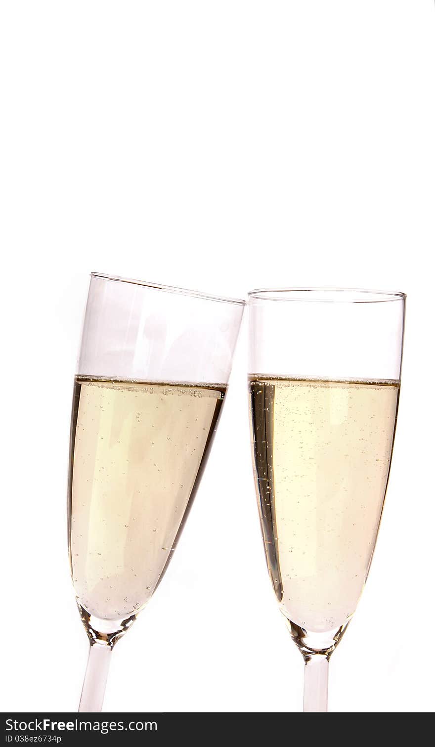 Studio photo of isolated champagne glasses on white background