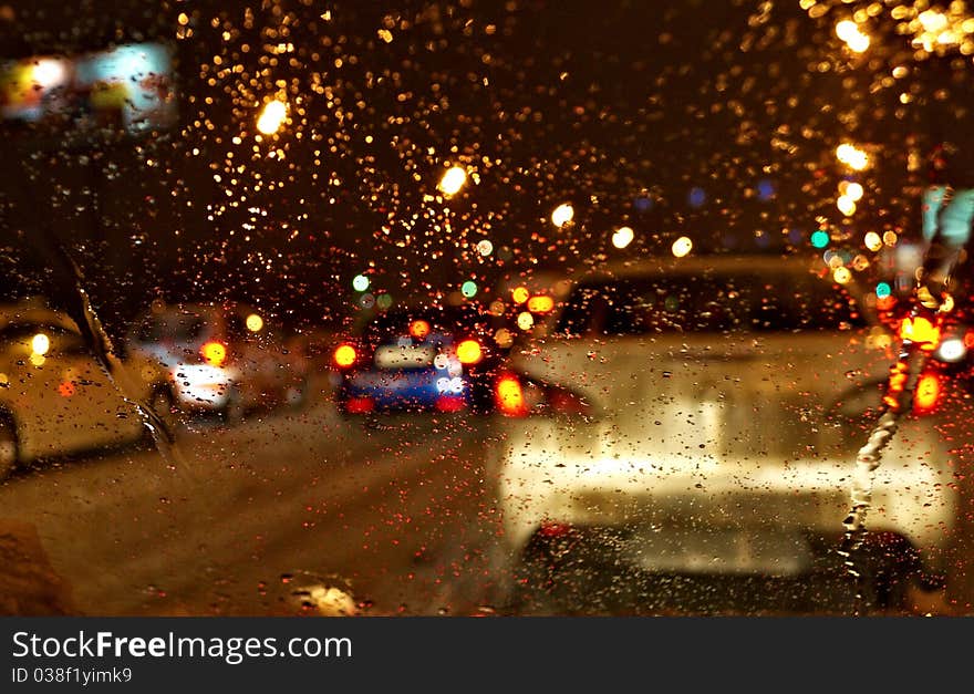 Kind from the car when in the street a rain. Kind from the car when in the street a rain