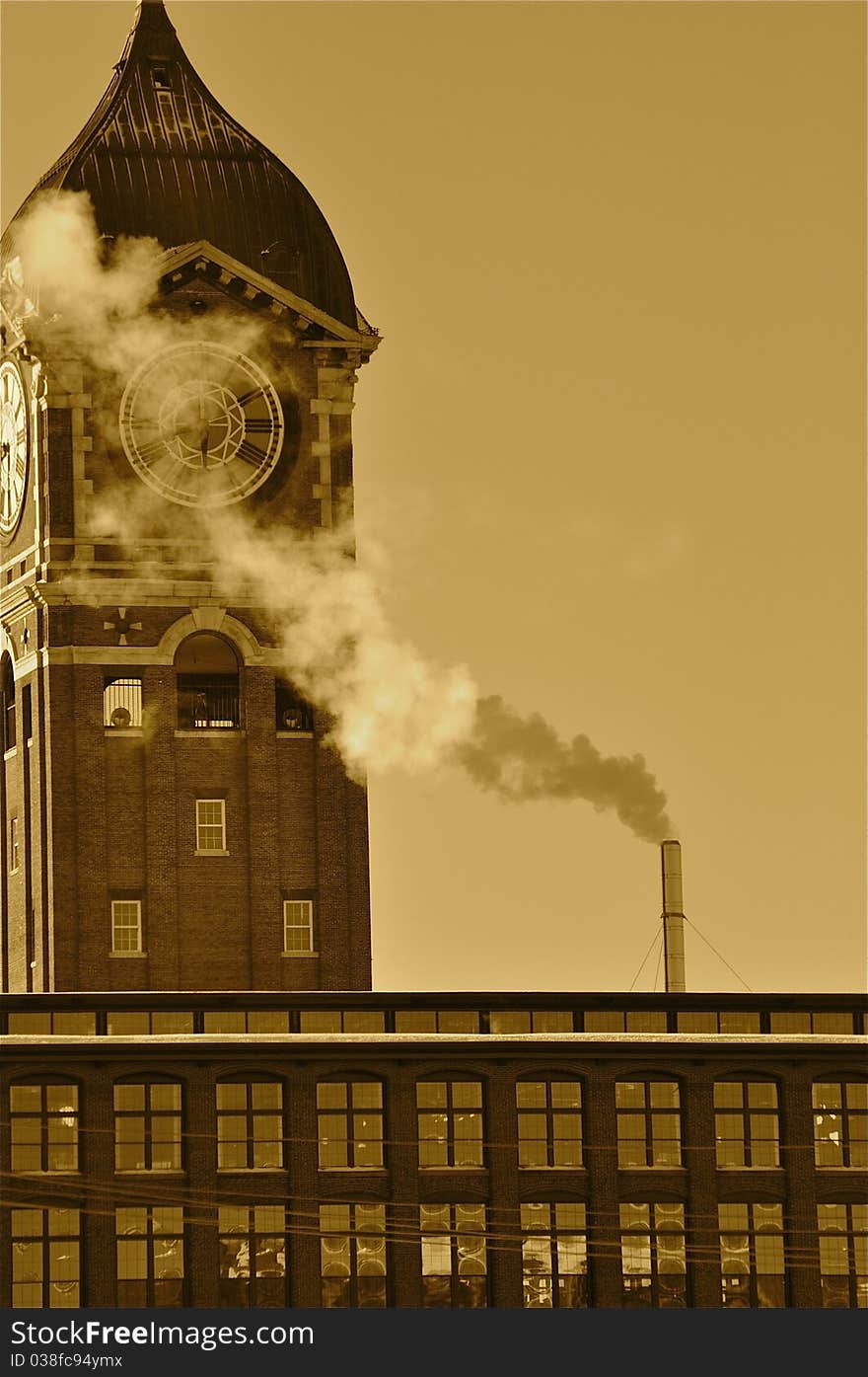 Pollution spewing into the air from industrial chimneys, in sepia (after and before). Pollution spewing into the air from industrial chimneys, in sepia (after and before)