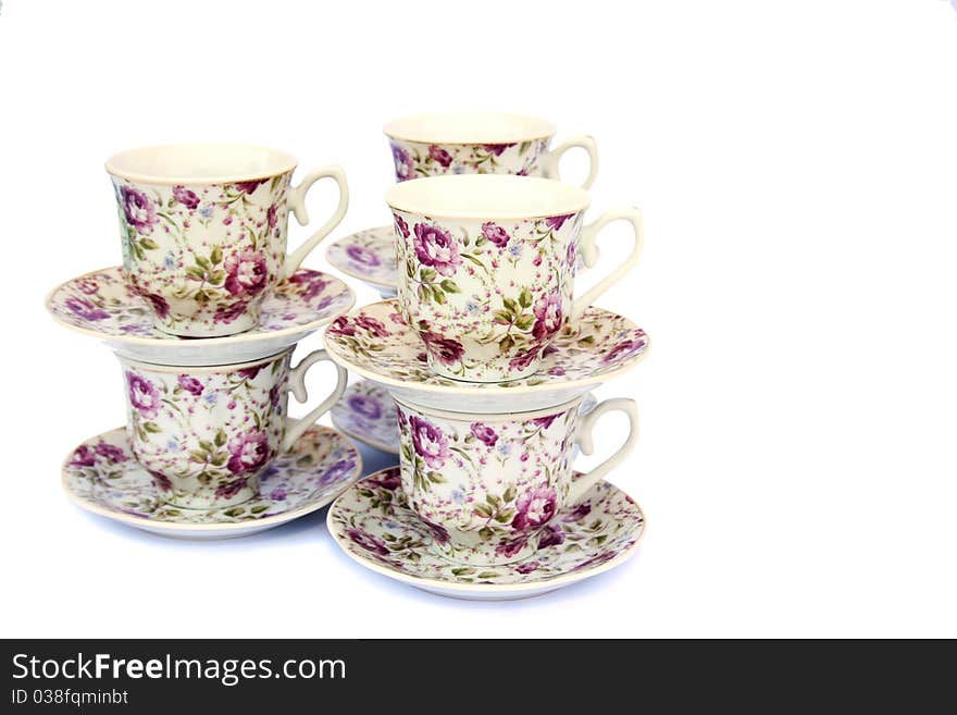 Cups with dishes isolated on white background.