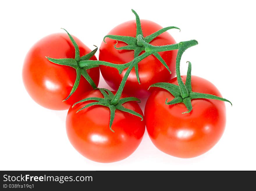 Organic tomatos on white background