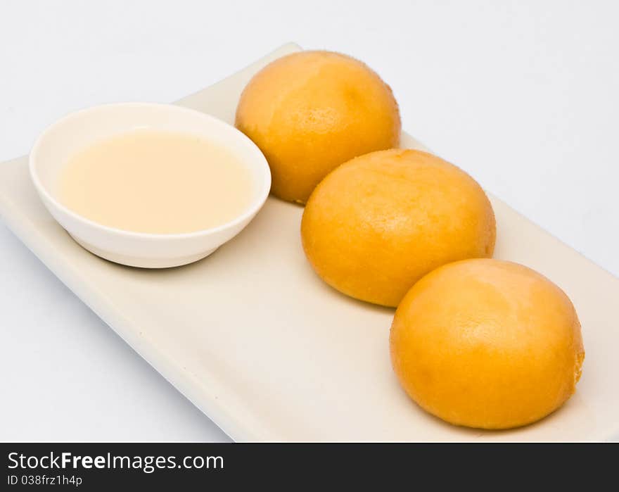 Fried Sweet Cream Bun On Dish