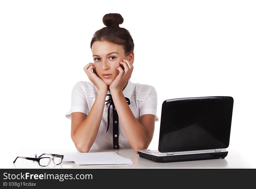 Friendly woman sitting and looks coquettishly