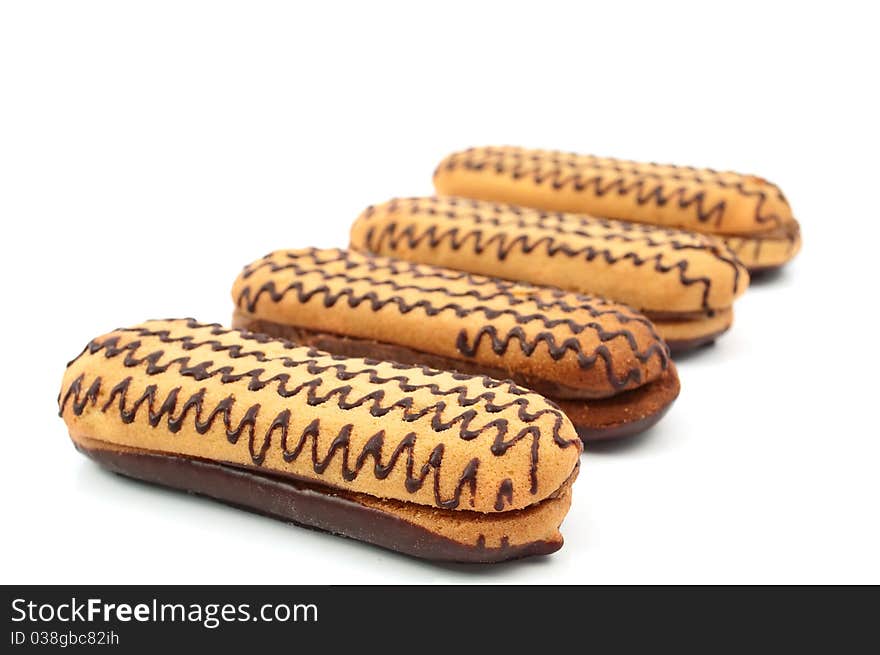 Cake with chocolate icing on a white background