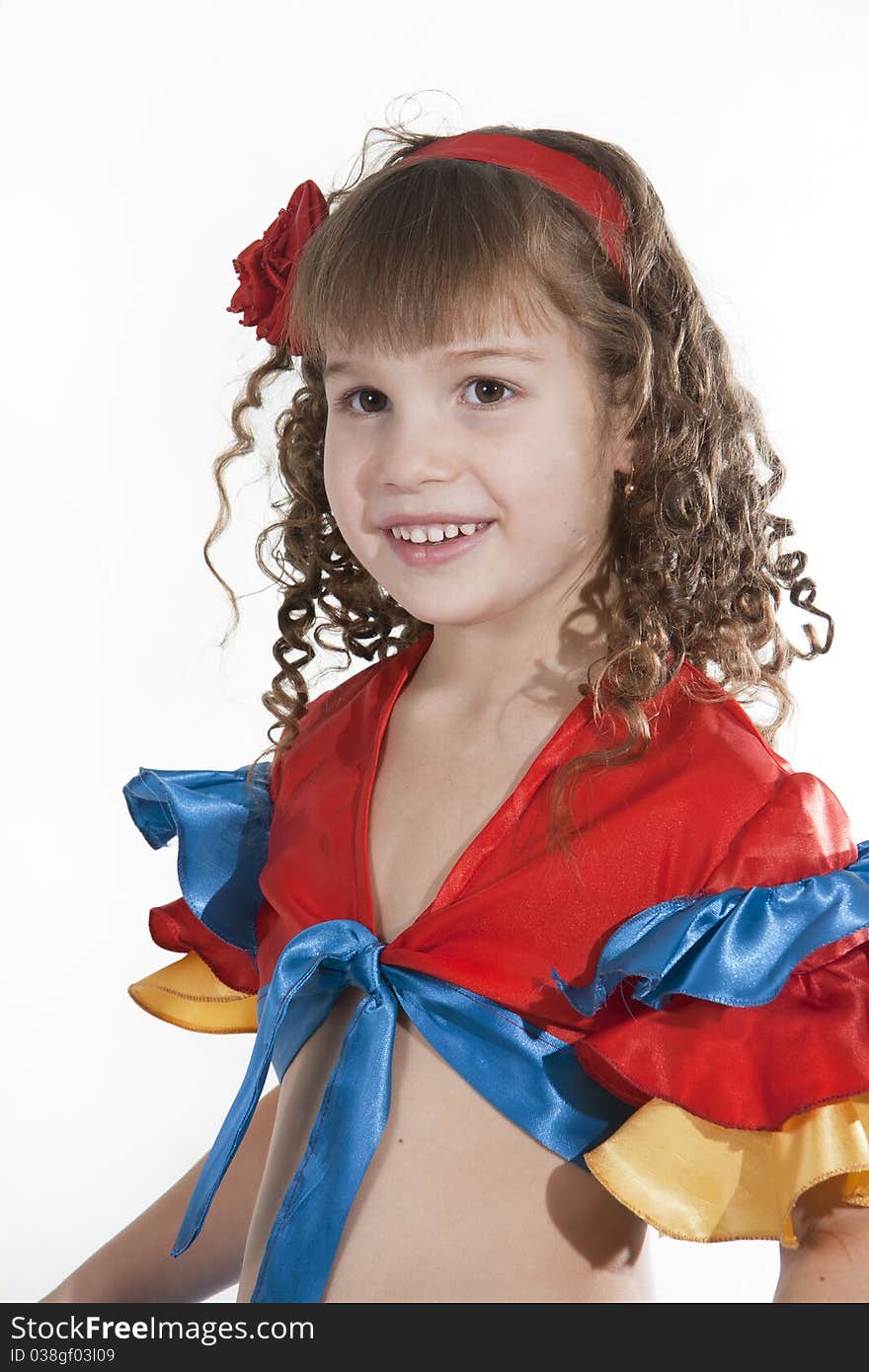 Portrait of the little girl dancer to a white background. Portrait of the little girl dancer to a white background