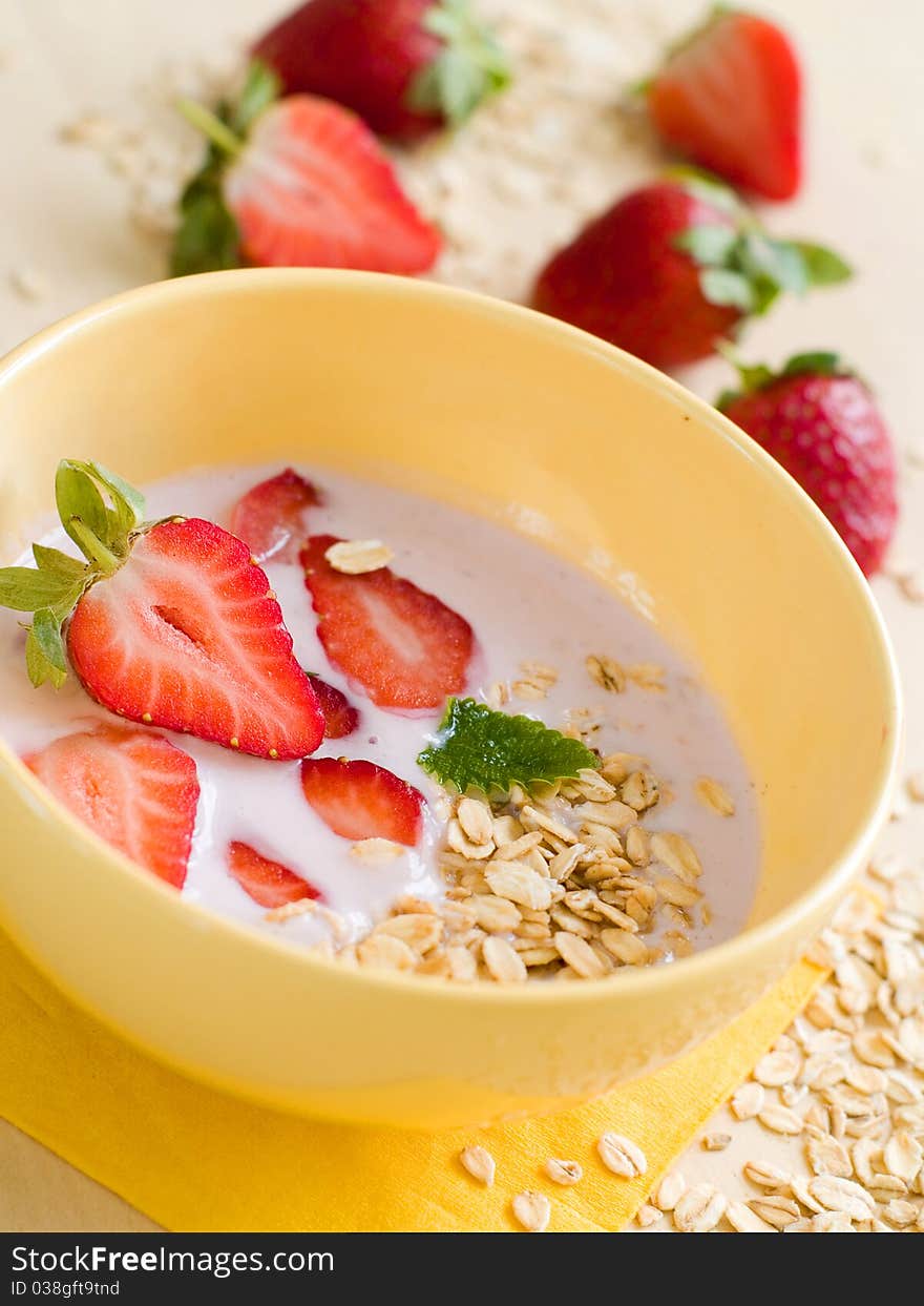 Yogurt breakfast with strawberry and oatmeal