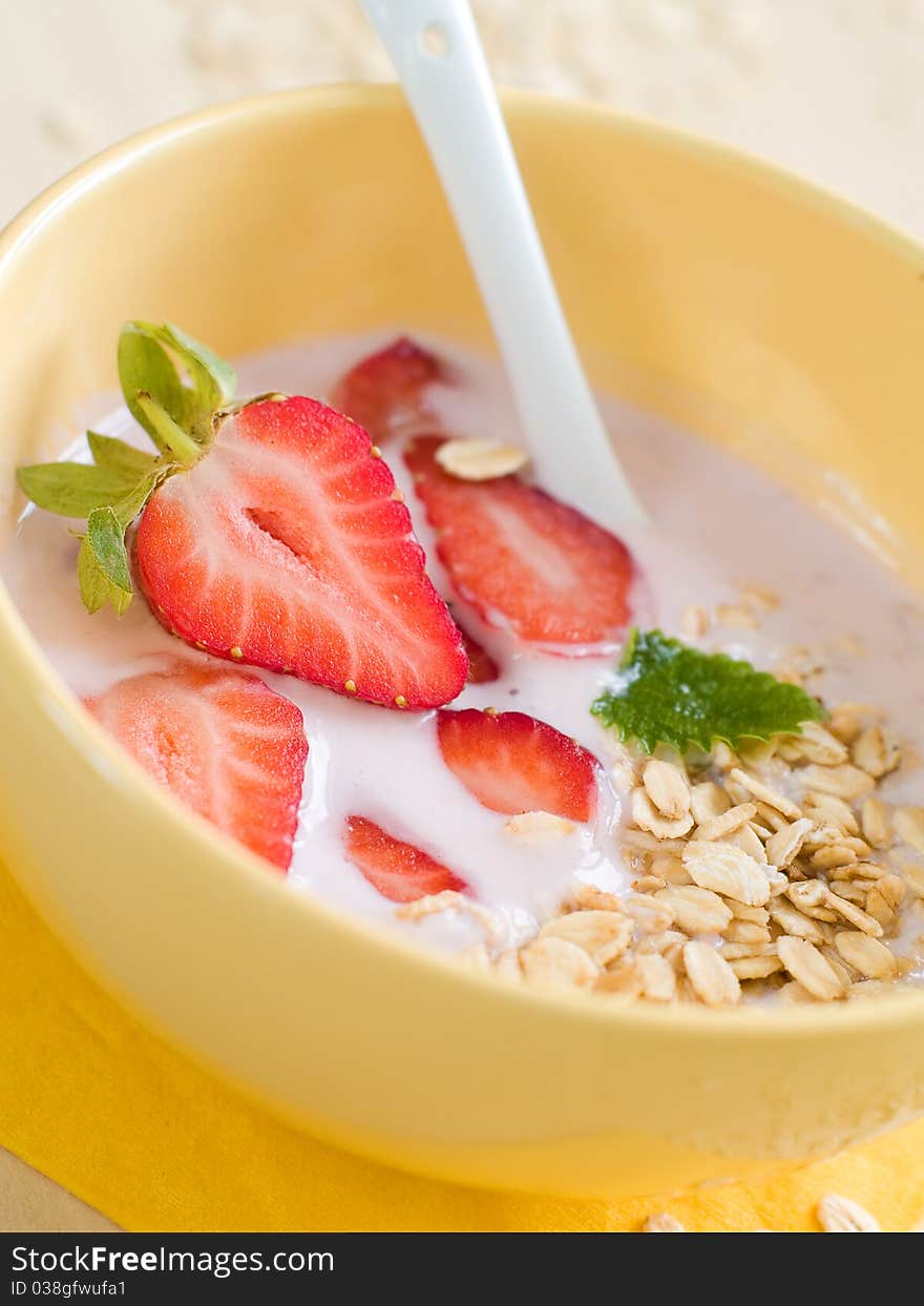 Yogurt breakfast with strawberry and oatmeal