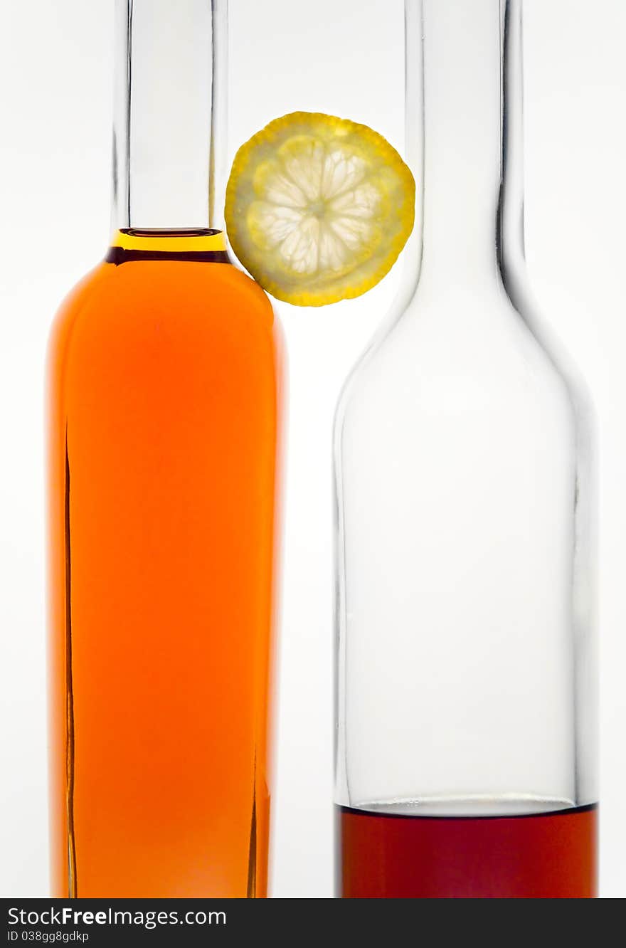 Two Bottles And Lemon