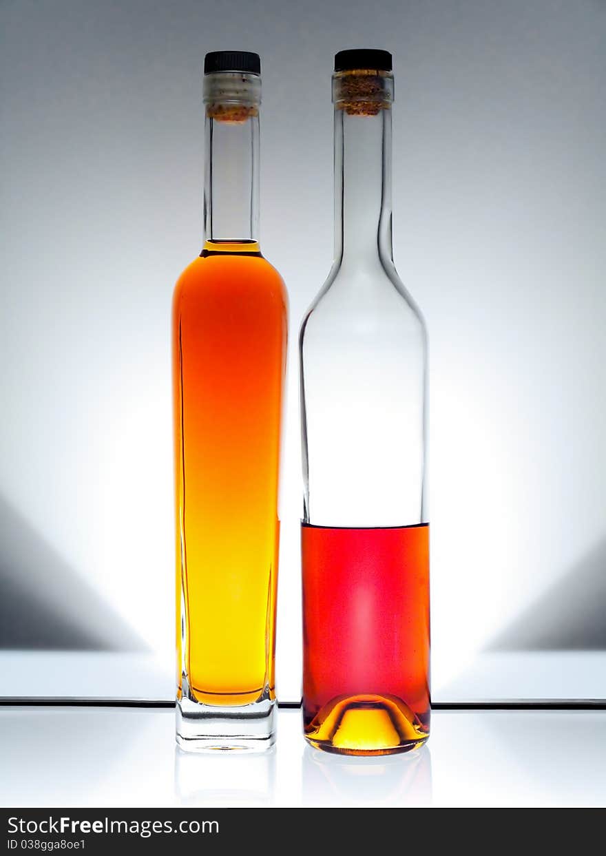 Two bottles on white background