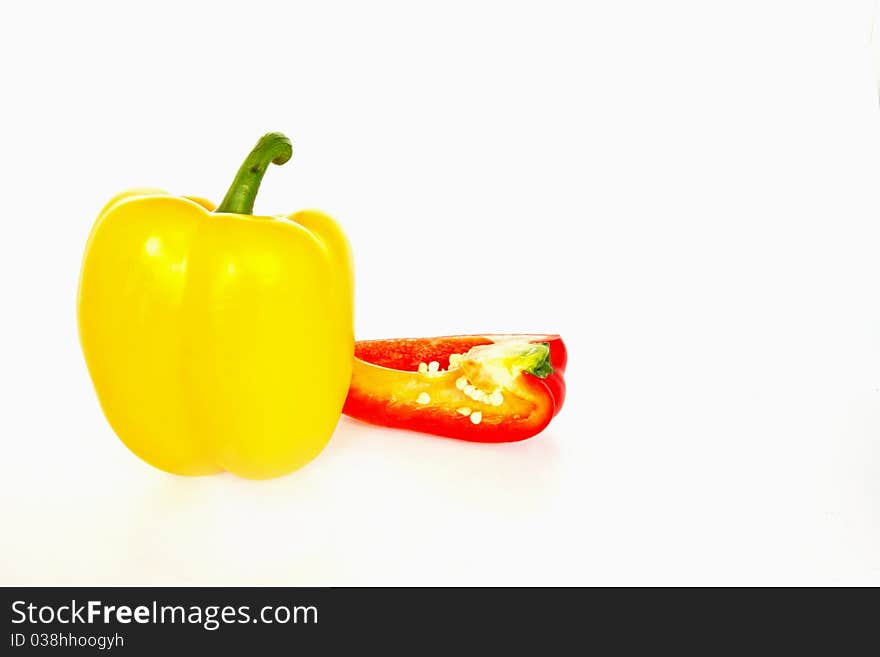 Yellow and Red sweet peppers isolated on a white background