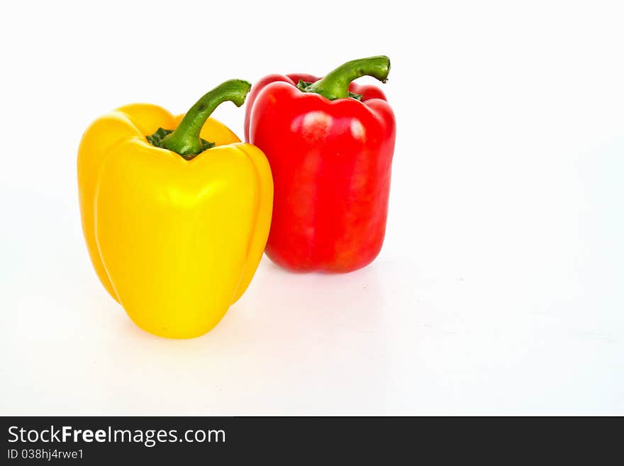 Yellow and Red sweet peppers isolated