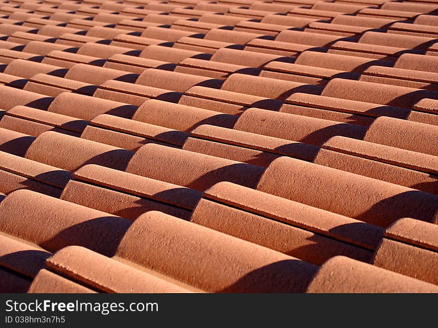 Red roof tiles pattern photo.