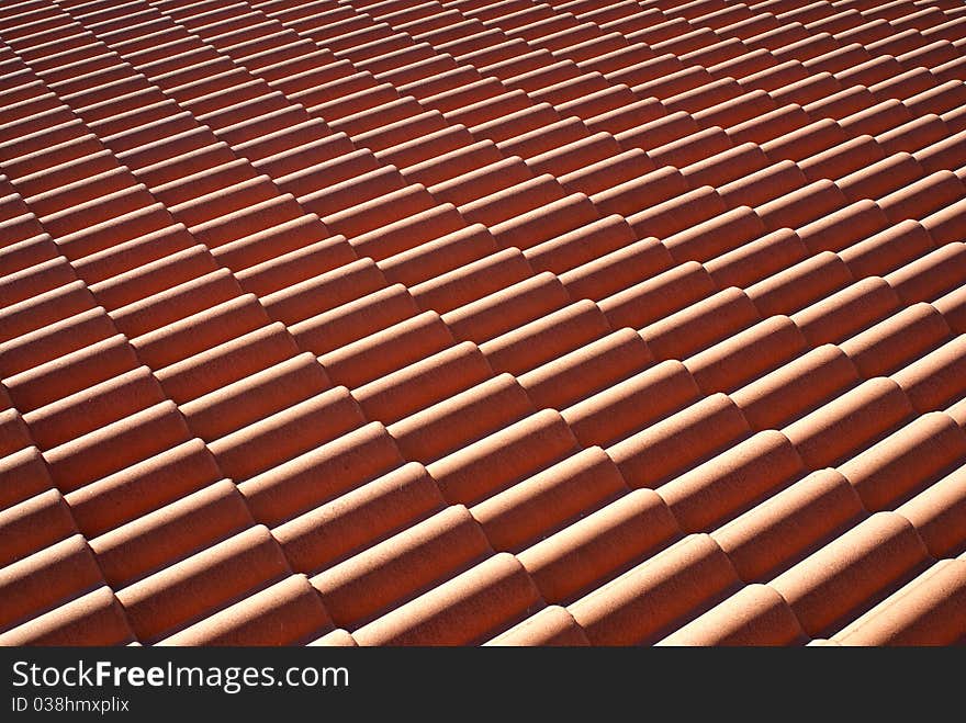 Red roof tiles pattern photo.