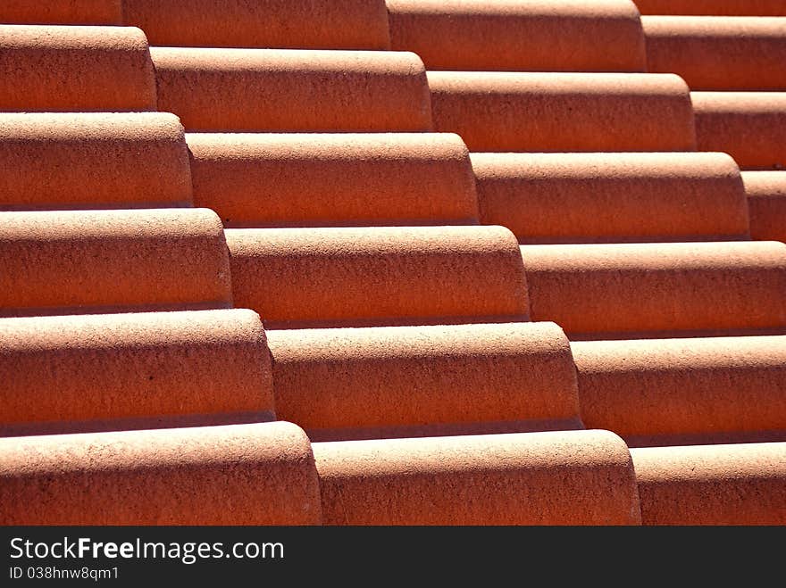 Red roof tiles pattern photo.