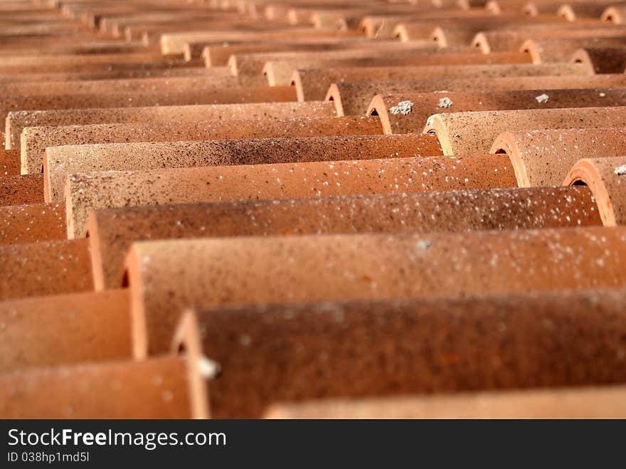 Red roof tiles pattern photo.