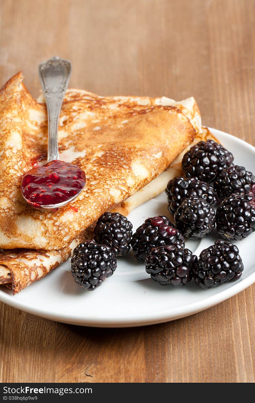 Plate of pancakes with fresh blackberries. Plate of pancakes with fresh blackberries