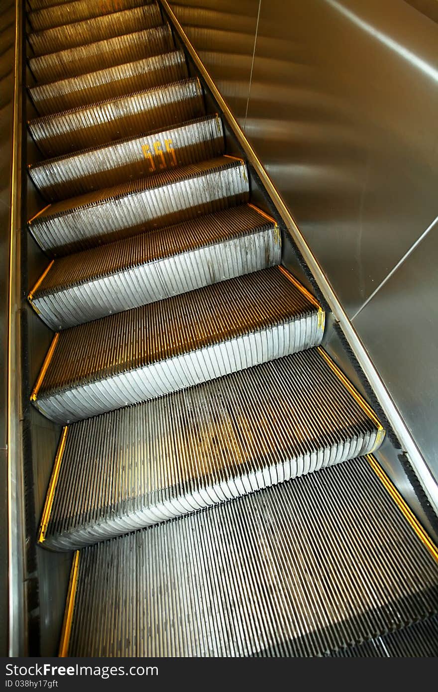 Metallic stairs of the subway elevator. Metallic stairs of the subway elevator